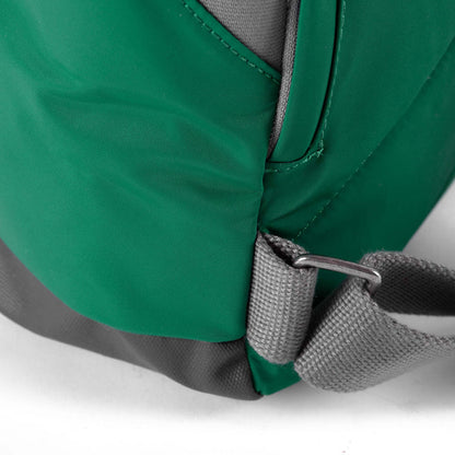 close of emerald canfield b backpack's strap attachments.