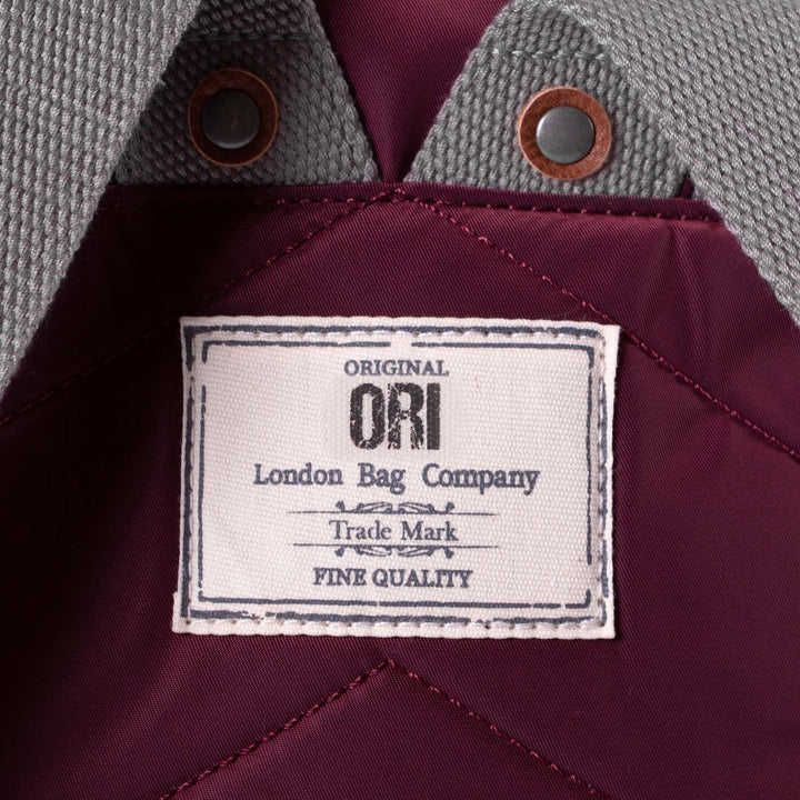 close-up of Ori London patch on back of canfield backpack.