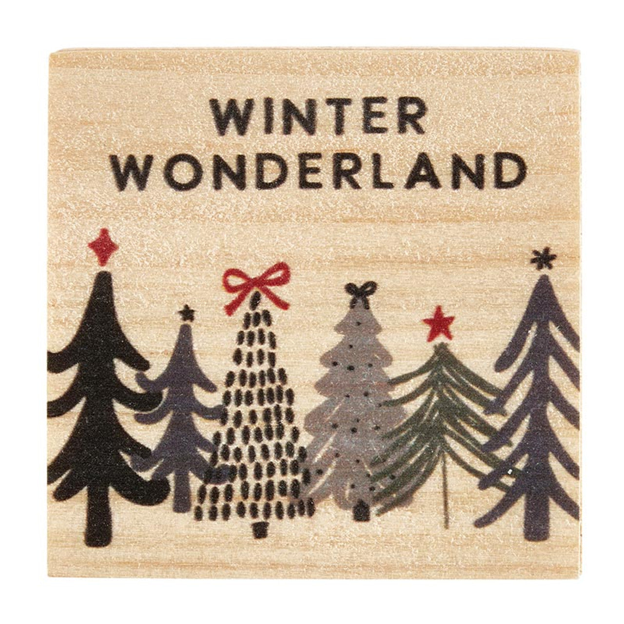 top view of wood box with a row of trees and "winter wonderland" printed on it.