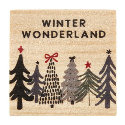 top view of wood box with a row of trees and "winter wonderland" printed on it.