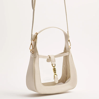 angled view of paige in ivory hanging from the long strap