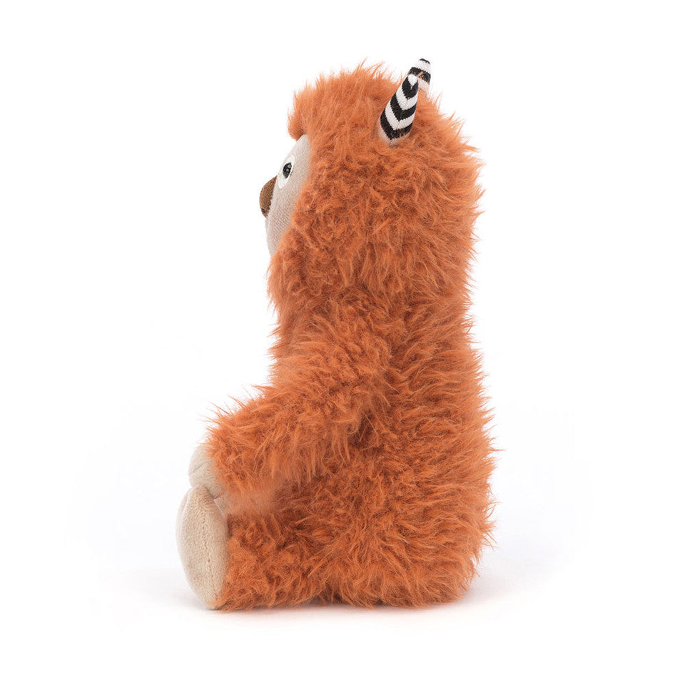 side view of Pip Monster Plush Toy.