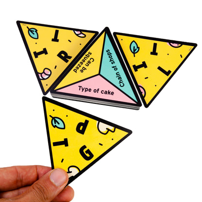 a person playing the boxed game of P for Pizza on a white background