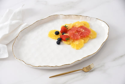 Portofino Large Oval Platter with fruit on it.