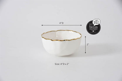 White bowl with gold rim and measurements on a light gray background