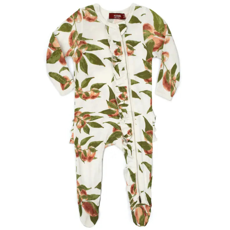 peaches footed ruffle romper on a white background.