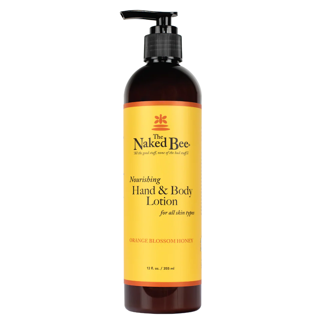 A 12 oz pump bottle of The Naked Bee Nourishing Hand & Body Lotion in Orange Blossom Honey scent, featuring a bright yellow label on a dark amber bottle with a black pump dispenser.