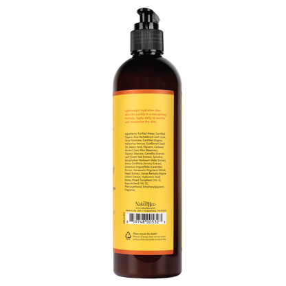back view of bottle of  Nourishing Hand & Body Lotion in Orange Blossom Honey scent
