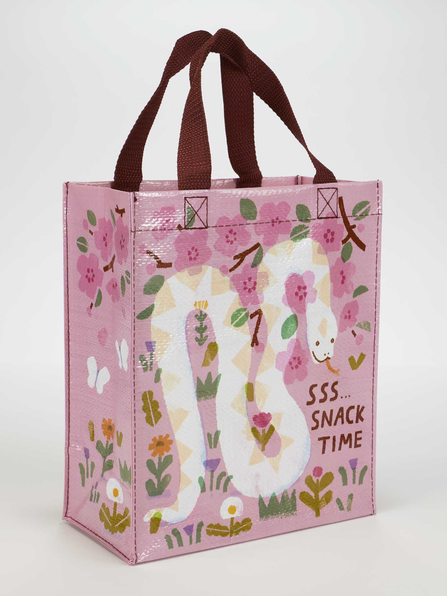 front view of pink floral tote bag with a white snake and text saying sss…snack time