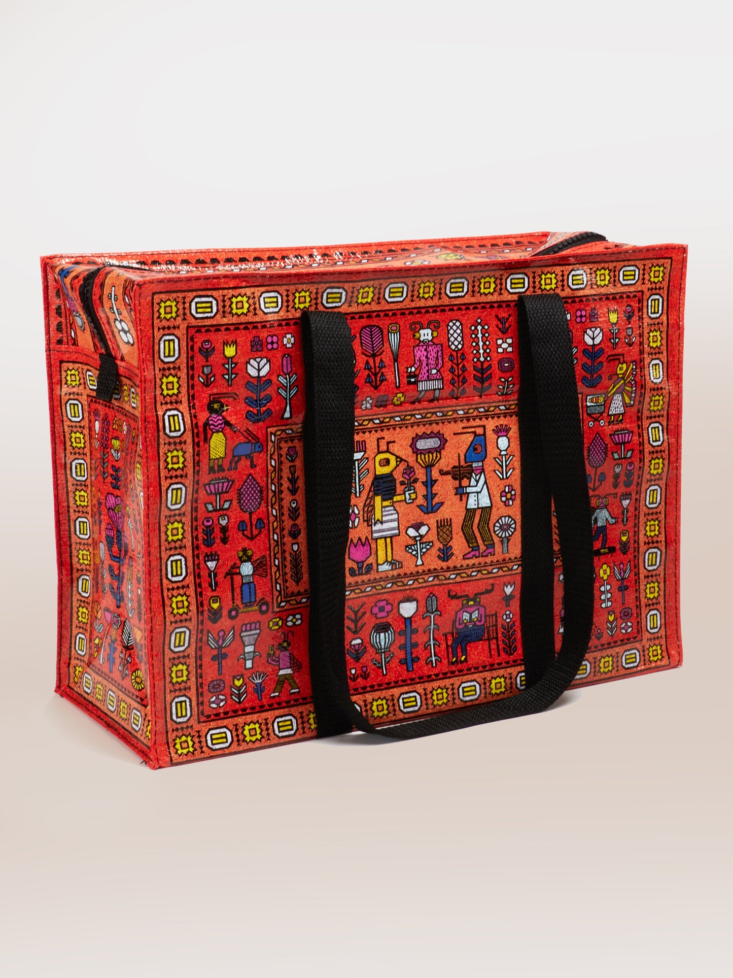 black handled red tote bag with a magic carpet pattern