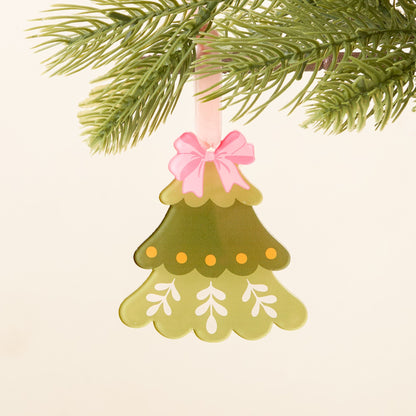 green Christmas tree ornament with pink bow on top