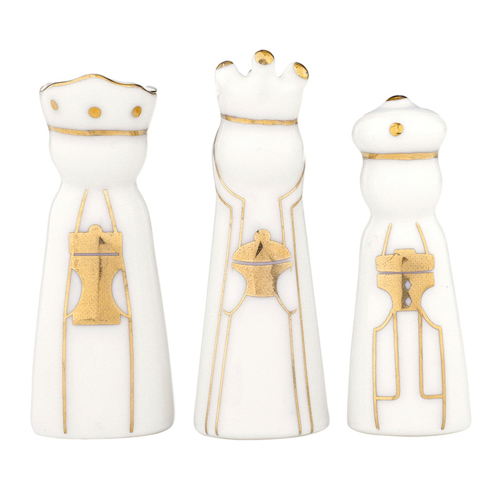 3 white ceramic wise men with gold accents shown on a white background