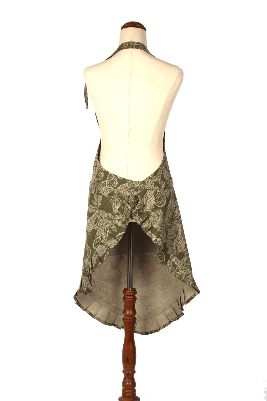 back view of olive green fig apron on a mannequin.