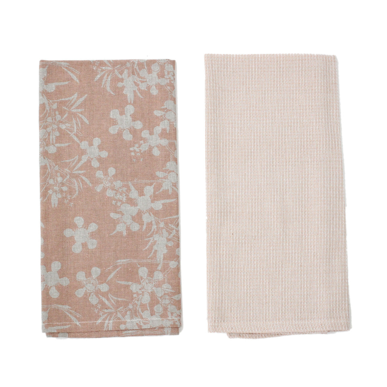 2 clay colored dishtowels folded on a white background.
