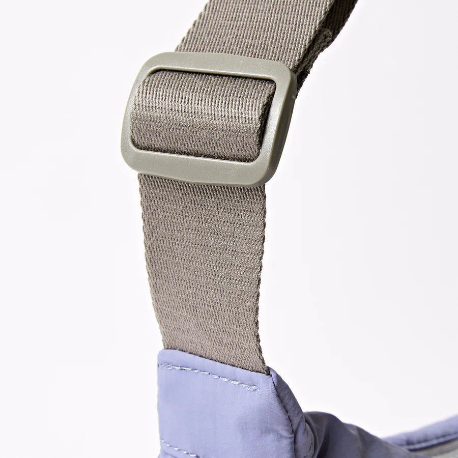 close-up of grey strap on lavender bag