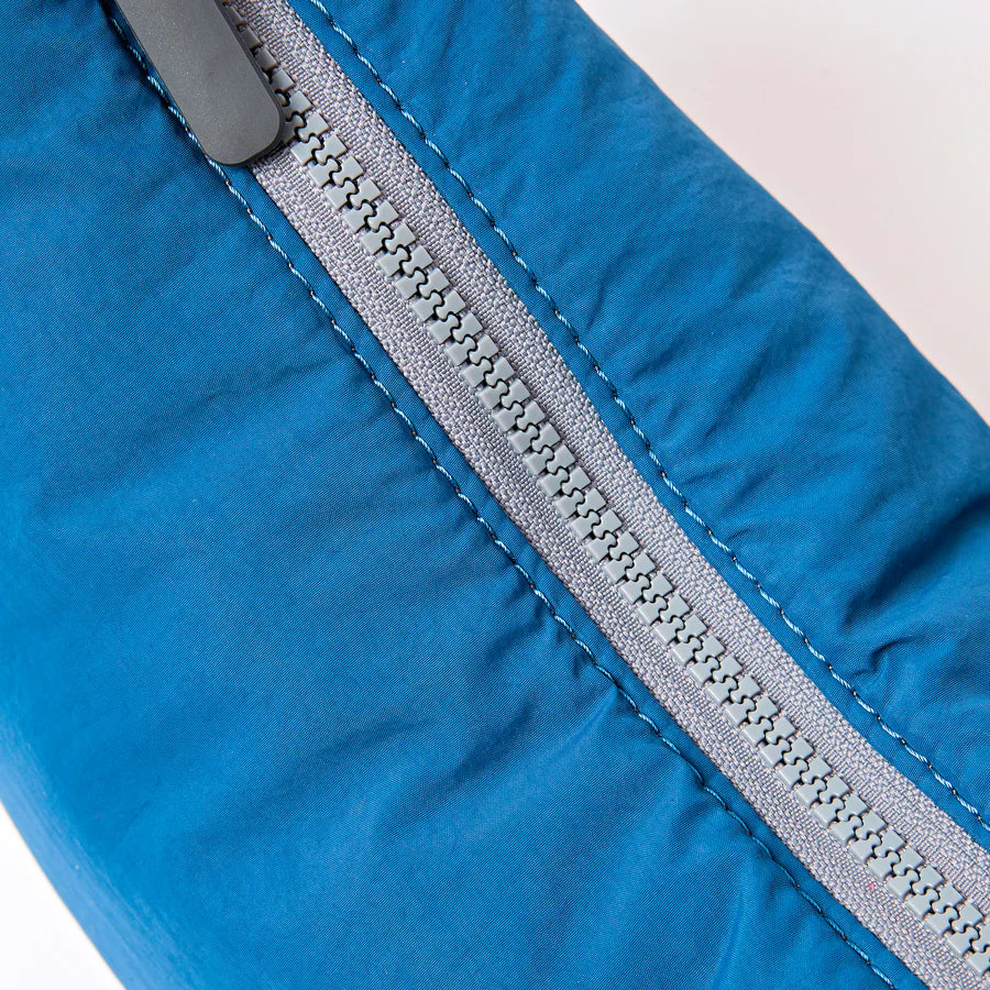 top view of farringdon blue bag with zipper zipped closed