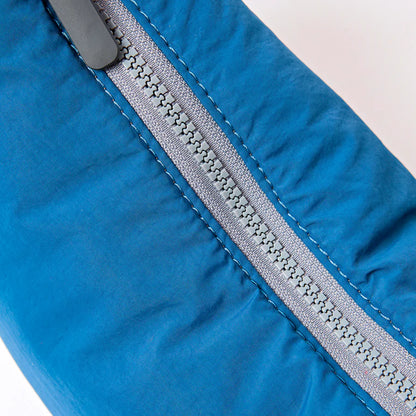 top view of farringdon blue bag with zipper zipped closed