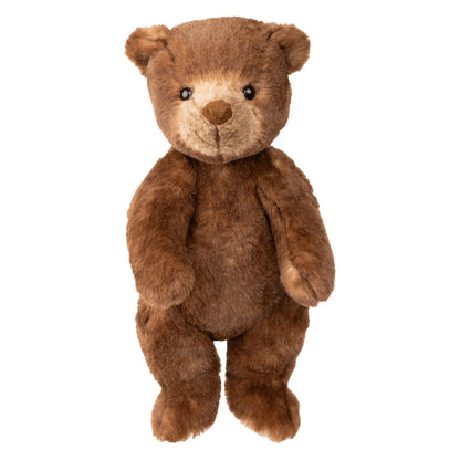 Brown teddy bear standing on a white background