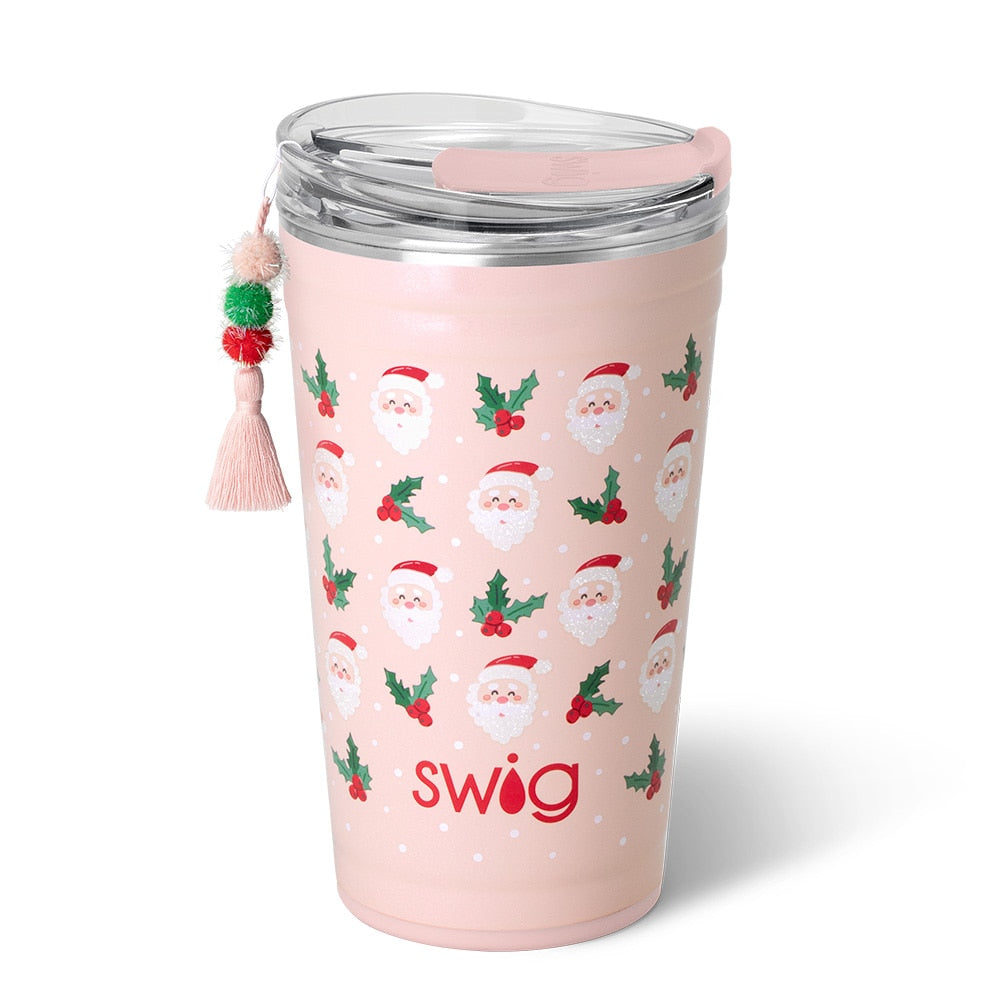 pink insolated cup with santa face and holly sprigs on it.