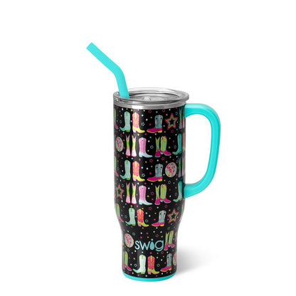 black tumbler with pattern of boots and stars in pinks, greens and blue and aqua handle and straw.