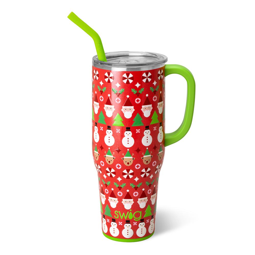 red tumbler with christmas grahics of santa, snowmen, reindeer, peppermints, trees, and holly sprigs.