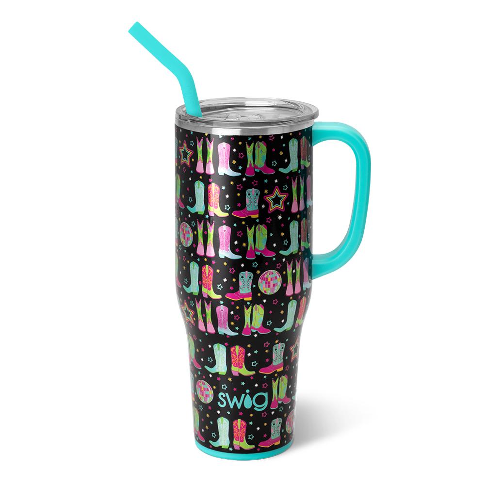 black tumbler with boots and stars design in pinks, greens, and blues on it and aqua handle and straw.