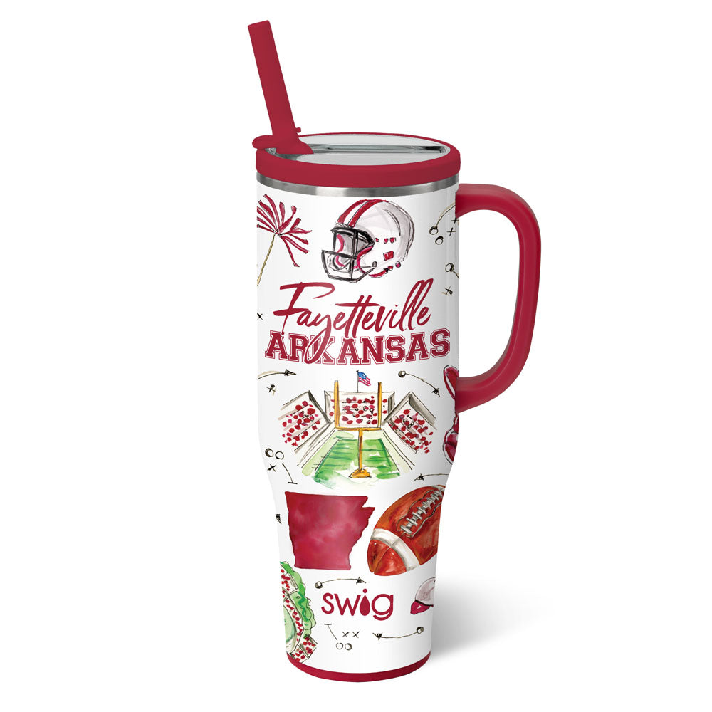 white tumble with "fayetteville ARKANSAS" and football themed graphics printed on  it and a red straw ans handle