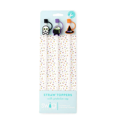 halloween straw toppers in the card packaging.