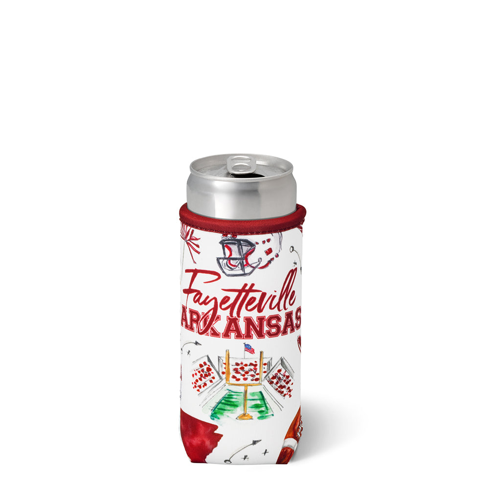 A slim white can cooler sleeve featuring 'Fayetteville Arkansas' in red script, decorated with red, green, and white football-themed illustrations, shown on a silver can with a white background.