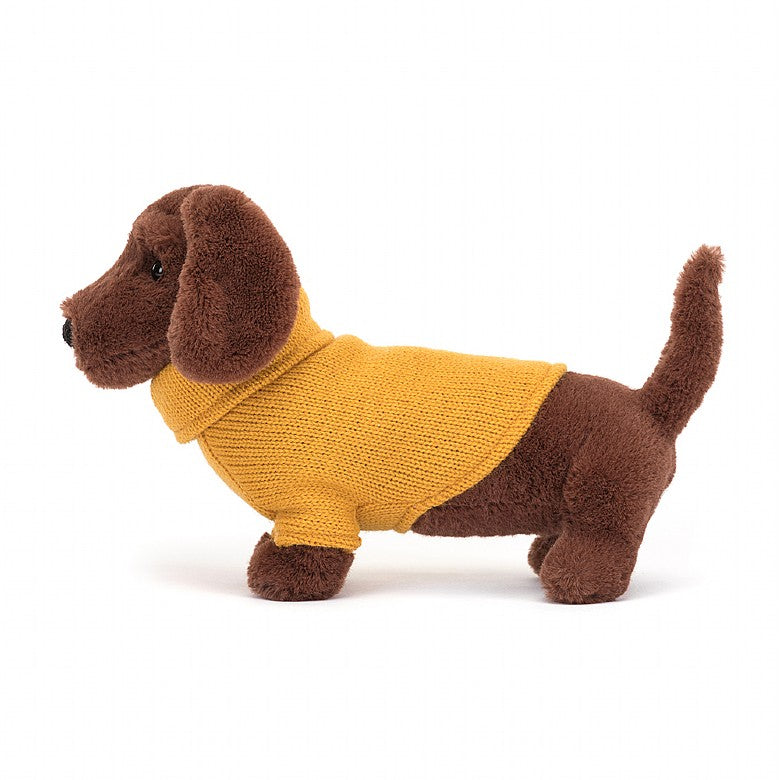 side view of the Yellow Sweater Sausage Dog Plush Toy displayed against a white background