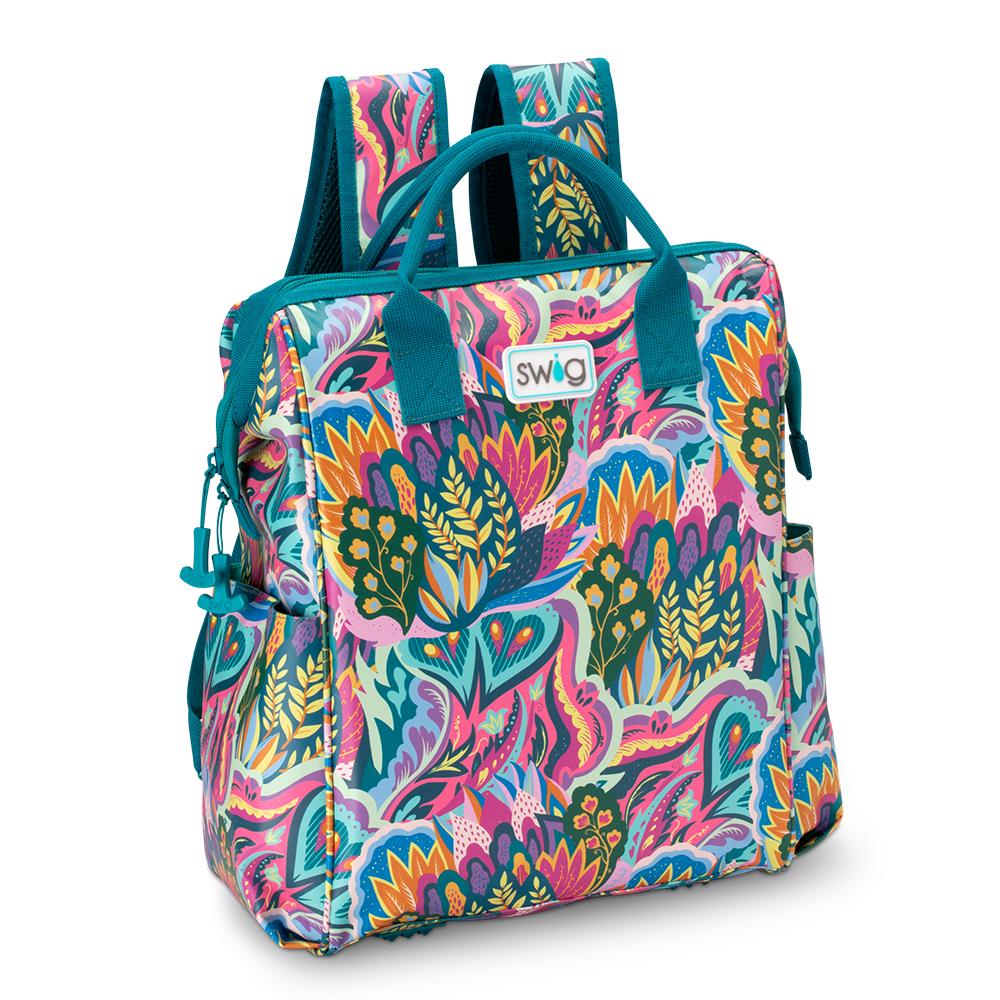 backpack cooler with colorful floral pattern and teal handles and binding.