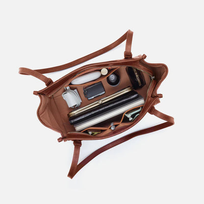 top down open view of the expedition small tote bag in the color pecan ridge with items inside the bag