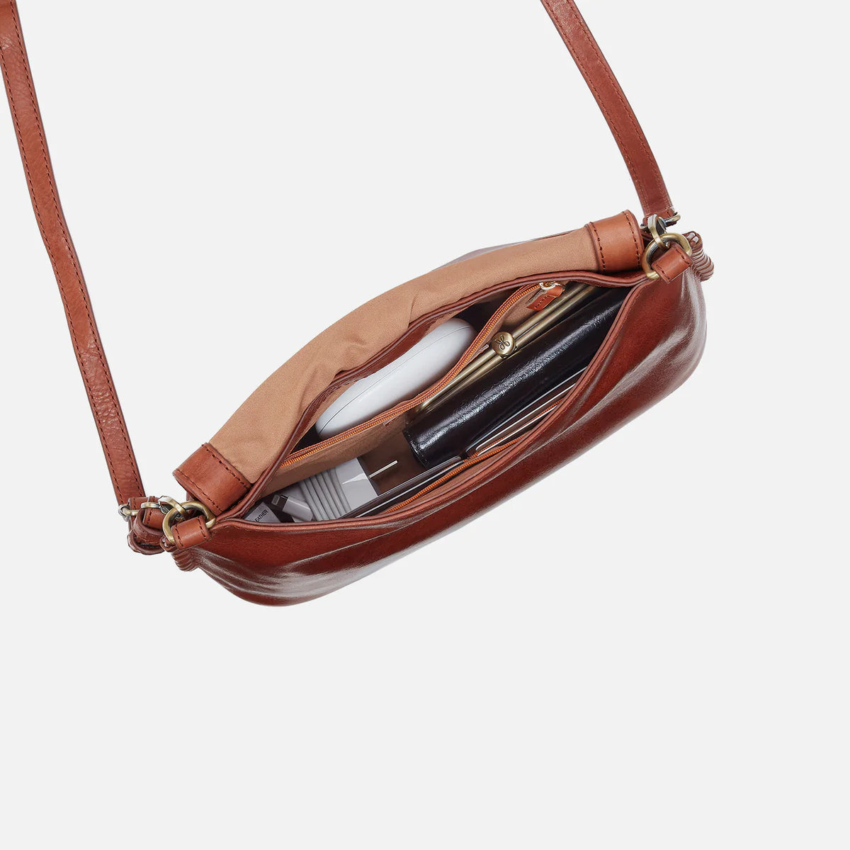 top down view of an open expedition crossbody in pecan ridge