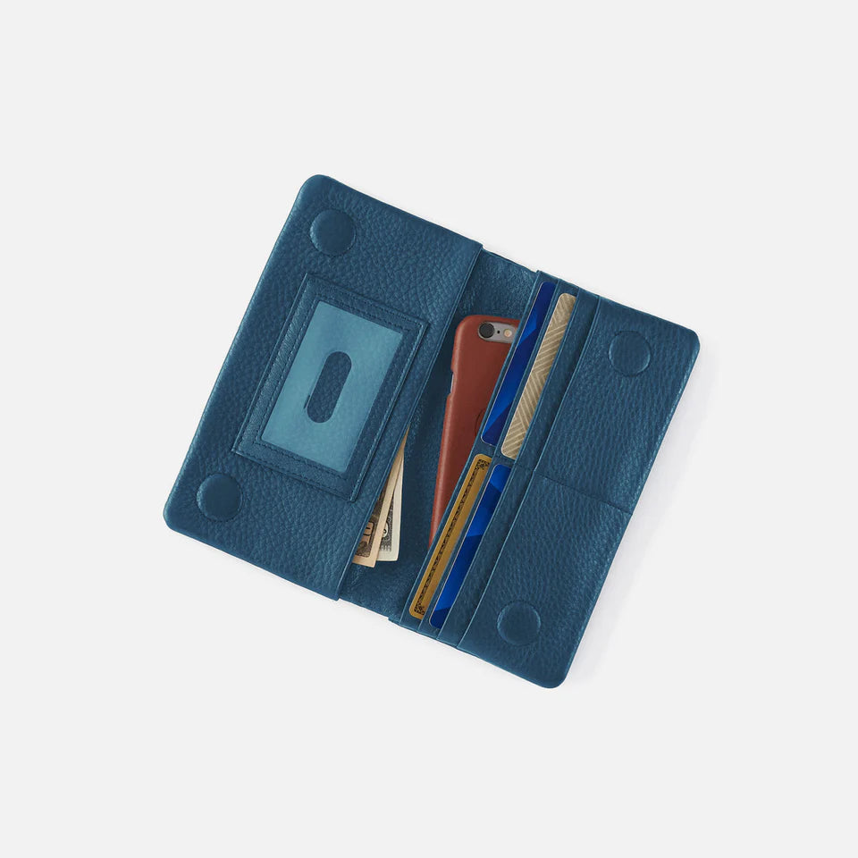 peacock feather Lumen Continental Wallet open with cards cash and phone inside