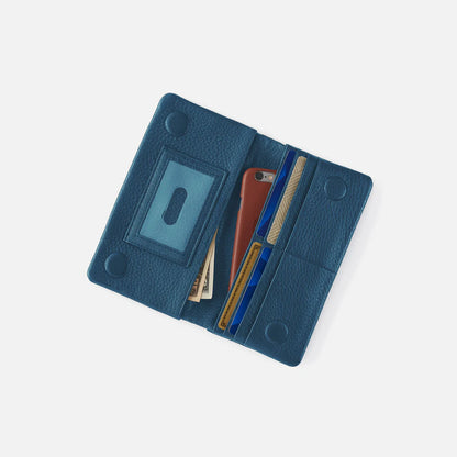 peacock feather Lumen Continental Wallet open with cards cash and phone inside