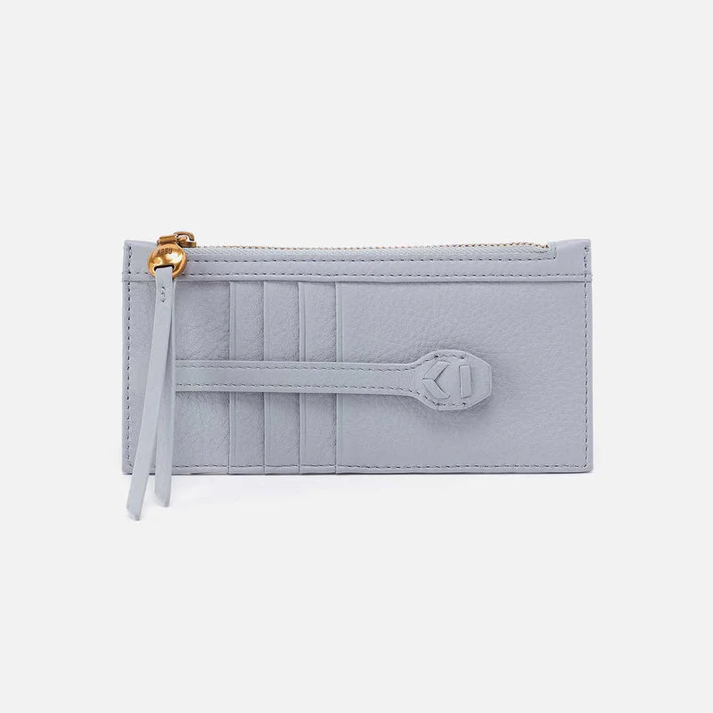 front view of carte card wallet in the light grey blue color called indigo cloud