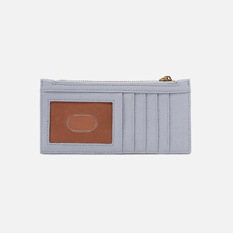 back I.D. view of carte card wallet in the light grey blue color called indigo cloud