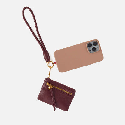 mulberry glaze Lasso Phone Wristlet with phone attached
