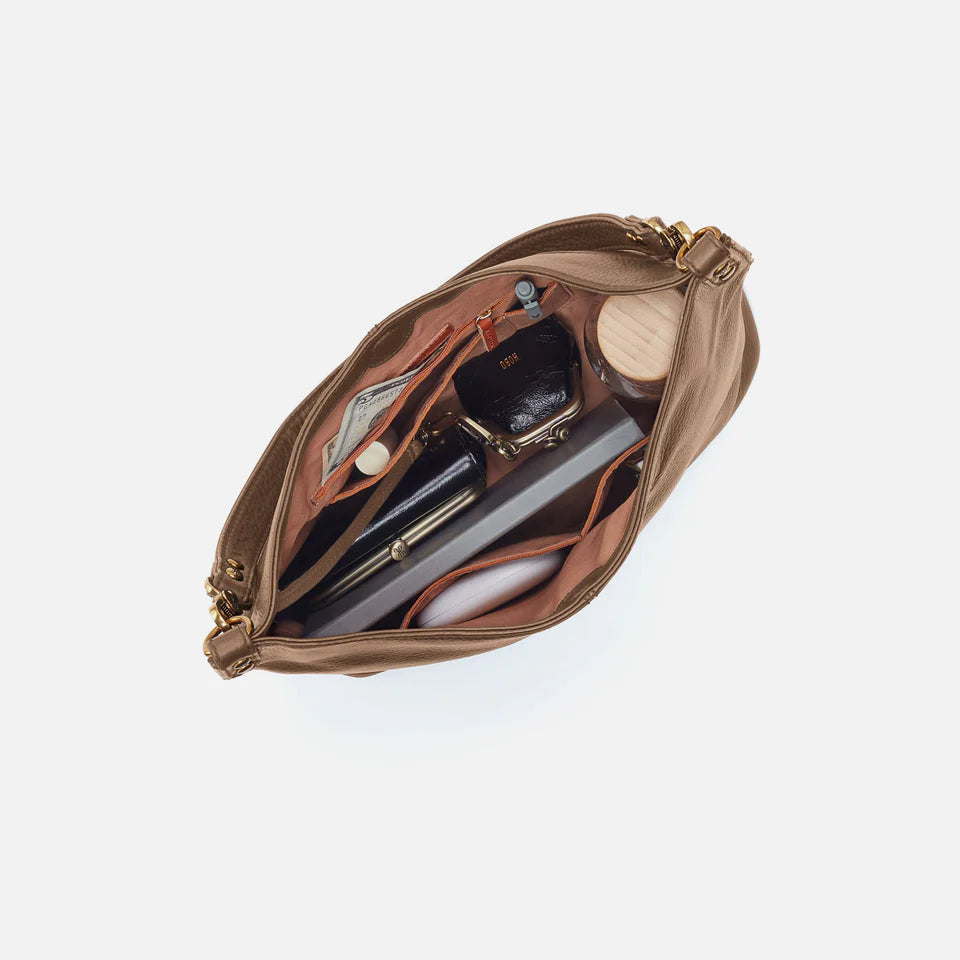 interior view of cedar sagebrush Pier Crossbody Shoulder Bag showing purse content