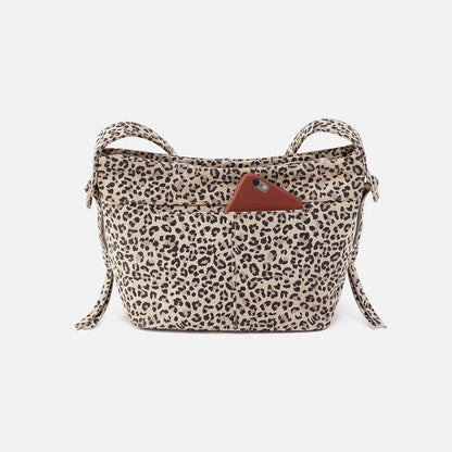 back view of leopard Bonita Crossbody with phone in pocket.