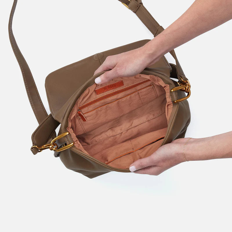 hands holding open harley bag showing interior.