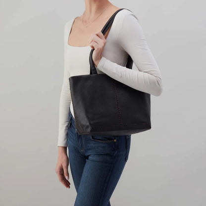 person wearing the Austin Tote in black