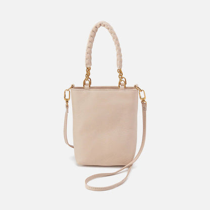 cream colored Tennessee Mini Bag shown on a white background