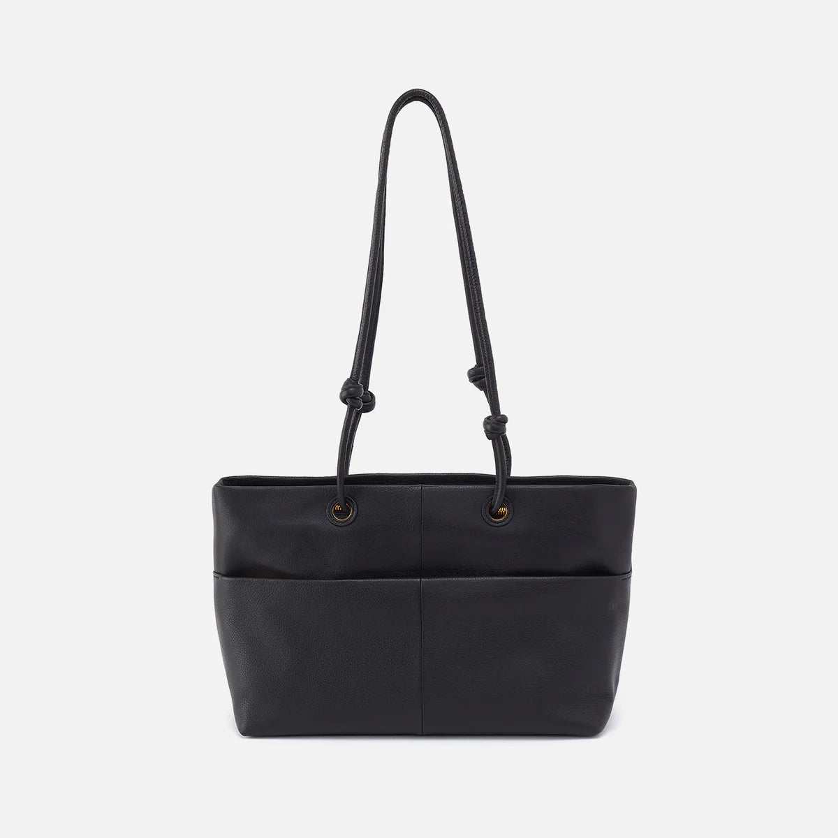 softie tote in black back view with long handles and large exterior pocket