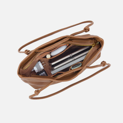 top down view of the softie tote in timber brown with stuff inside