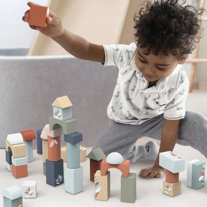 child playing with Building Block Set.