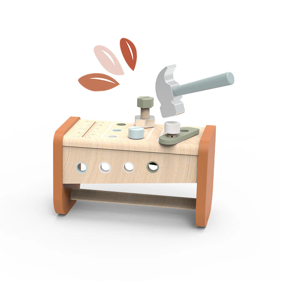 Wooden toy workbench with tools on a white background