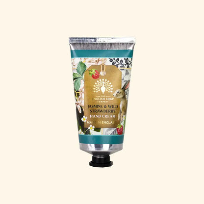 Hand cream tube with floral design on a white background