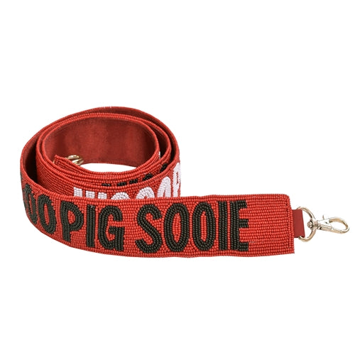 woo pig sooie bag strap rolled up.