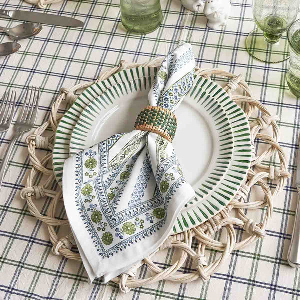 Sitio Stripe basil green plates on a set dinner table